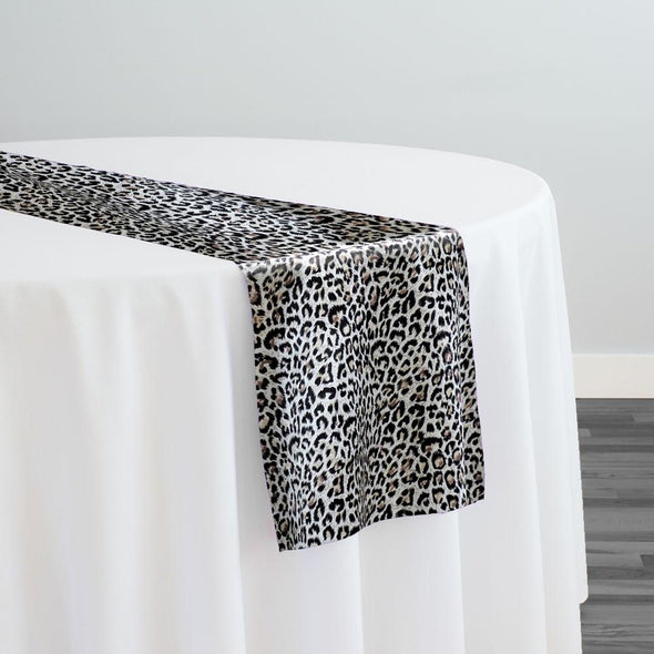 Black & white damask runner with white tablecloths, white spandex